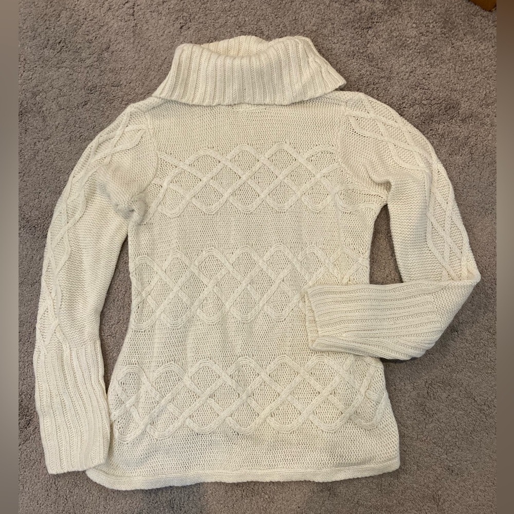 Cream-colored cable-knit sweater by JH Collectibles
